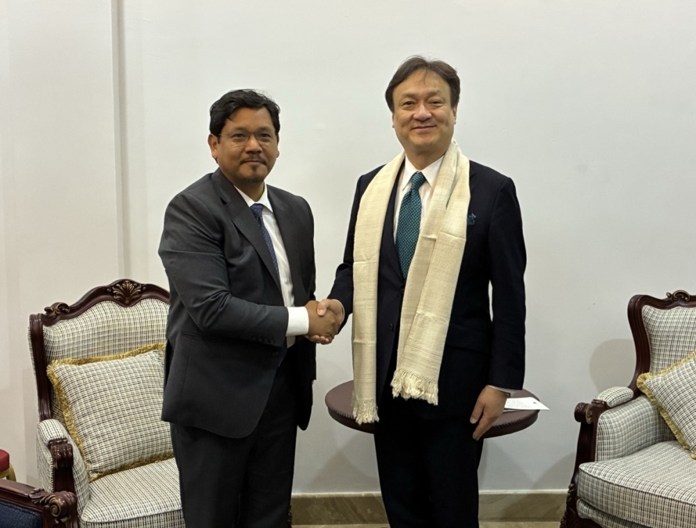 State Minister Horii shaking hands with Mr. Sangma, Chief Minister of Meghalaya