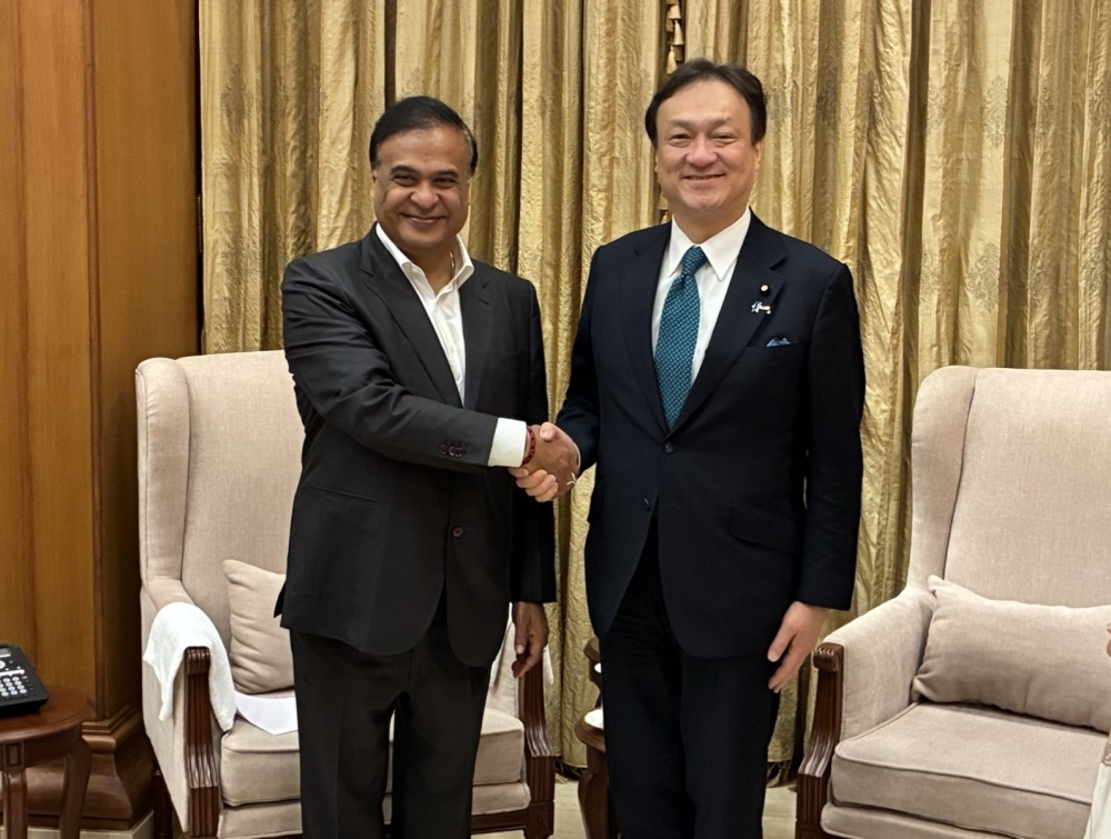 State Minister Horii shaking hands with Dr. Sarma, Chief Minister of Assam