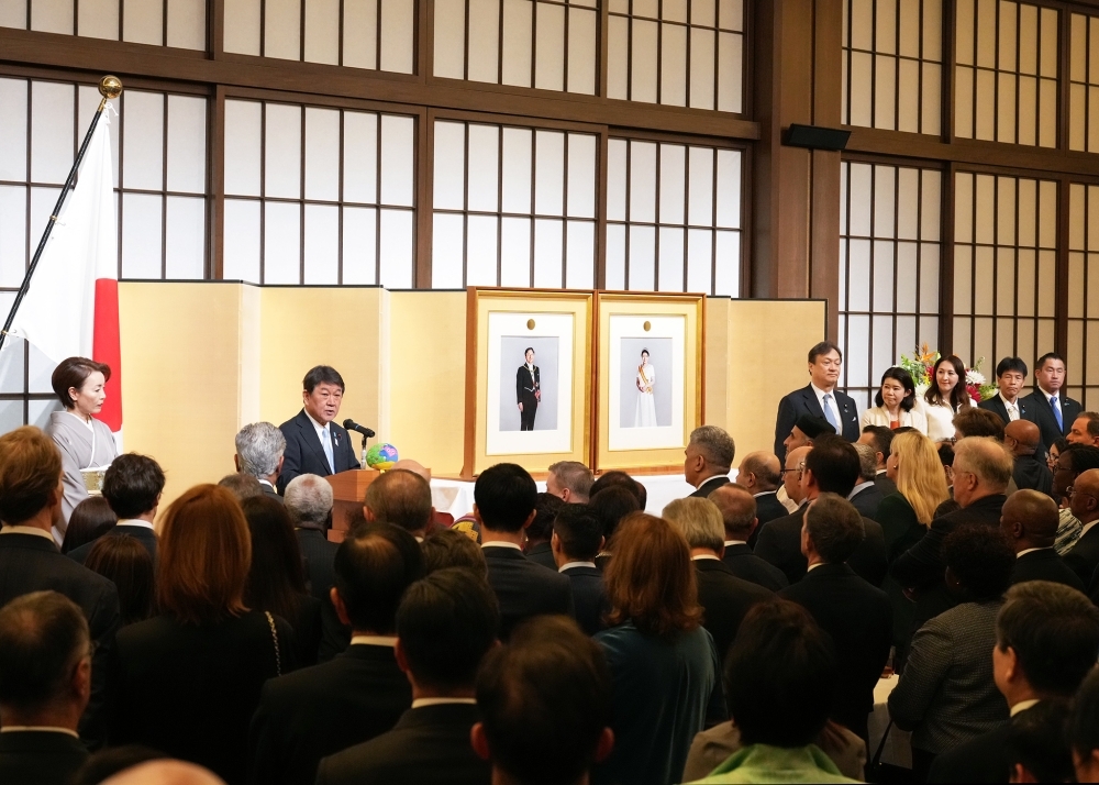 Minister MOTEGI giving a speech at the reception