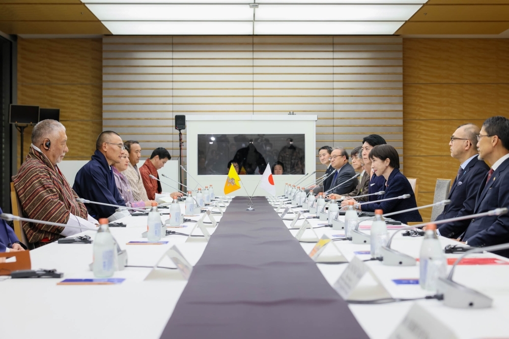 Prime Minister TAKAICHI talking with Prime Minister Tobgay at the meeting