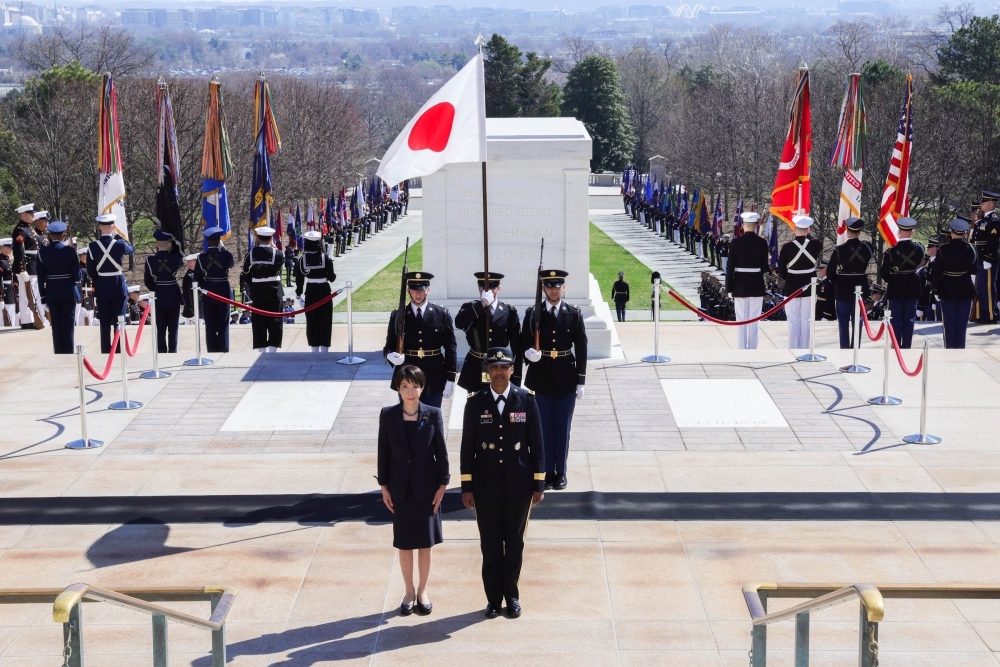Prime Minister TAKAICHI standing by Ms. Karen Durham-Aguilera in the ceremony