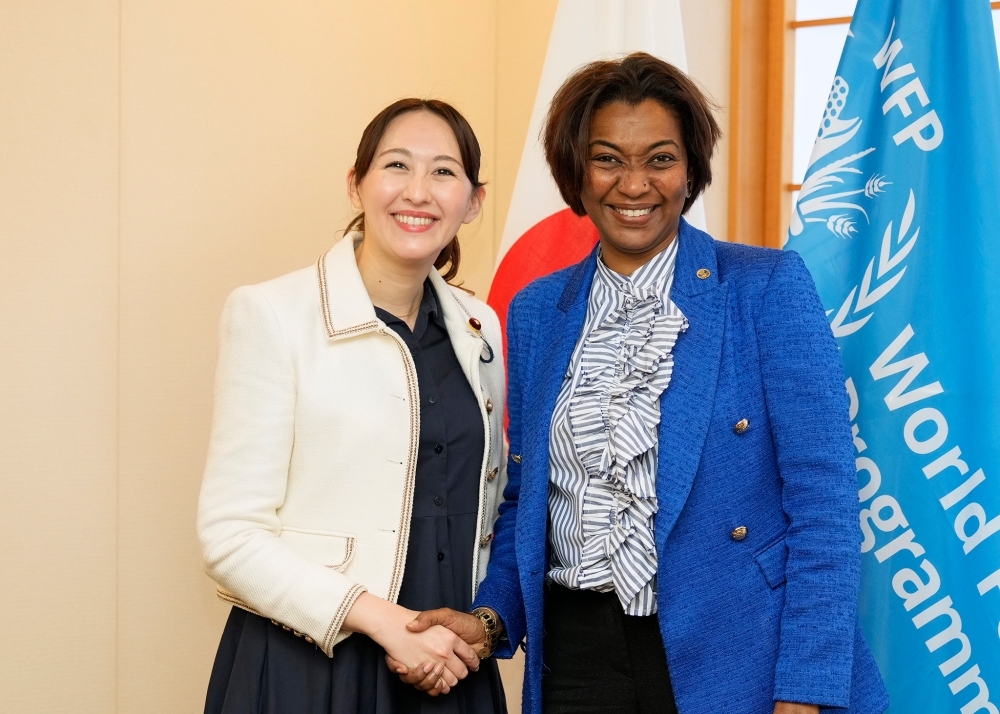 Parliamentary Vice-Minister ERI shaking hands with Ms. Rania DAGASH-KAMARA, Assistant Executive Director of WFP