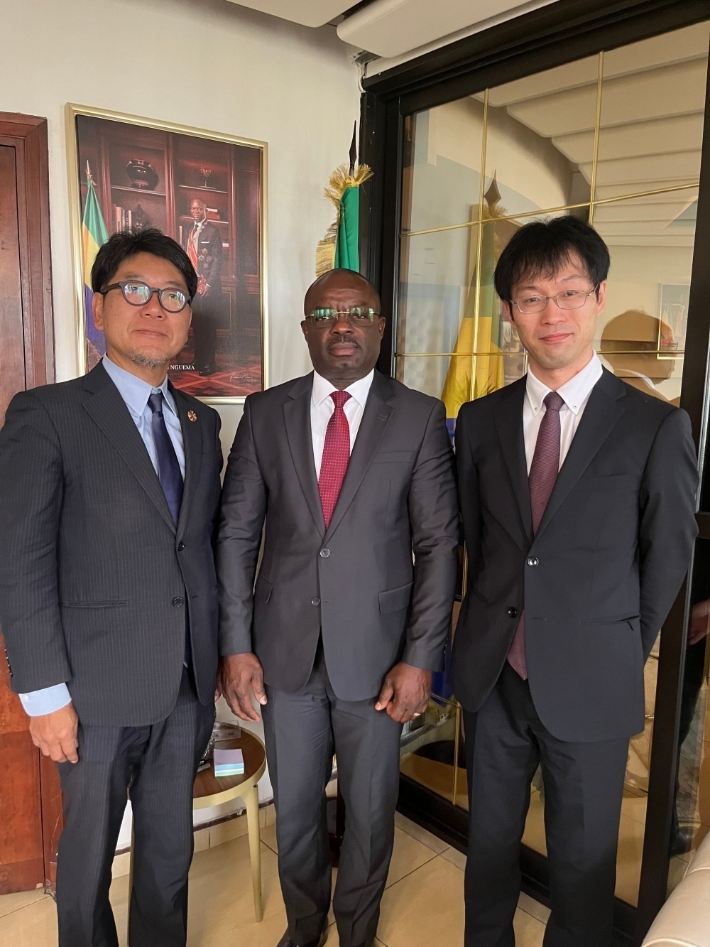 Mr. KAWASE and H.E. Mr. KONDJA, Minister of Petroleum and Gas, posing for a photograph