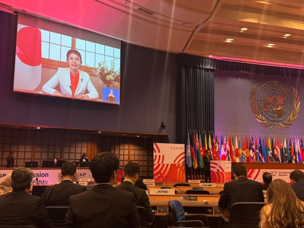 Participants listening intently to State Minister KUNIMITSU’s speech on the screen