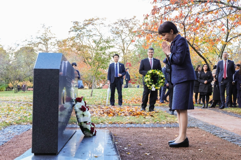 Prime Minister TAKAICHI offering flowers and silent prayer at the memorial for the late Mr. ABE Shinzo, Former Prime Minister of Japan