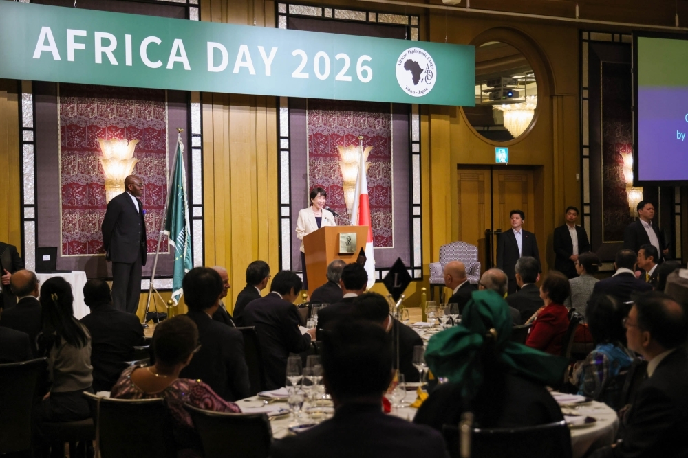 Prime Minister TAKAICHI at the podium