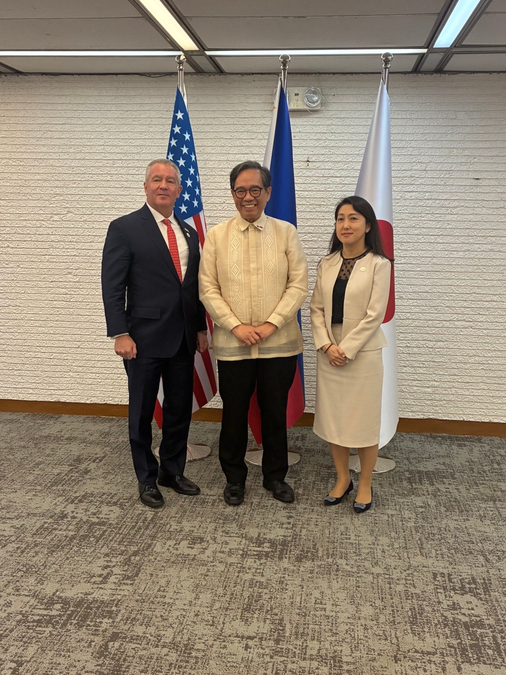 Group photo of Assistant Secretary DeSombre, Undersecretary Herrera-Lim, and Deputy Director-General HOKUGO