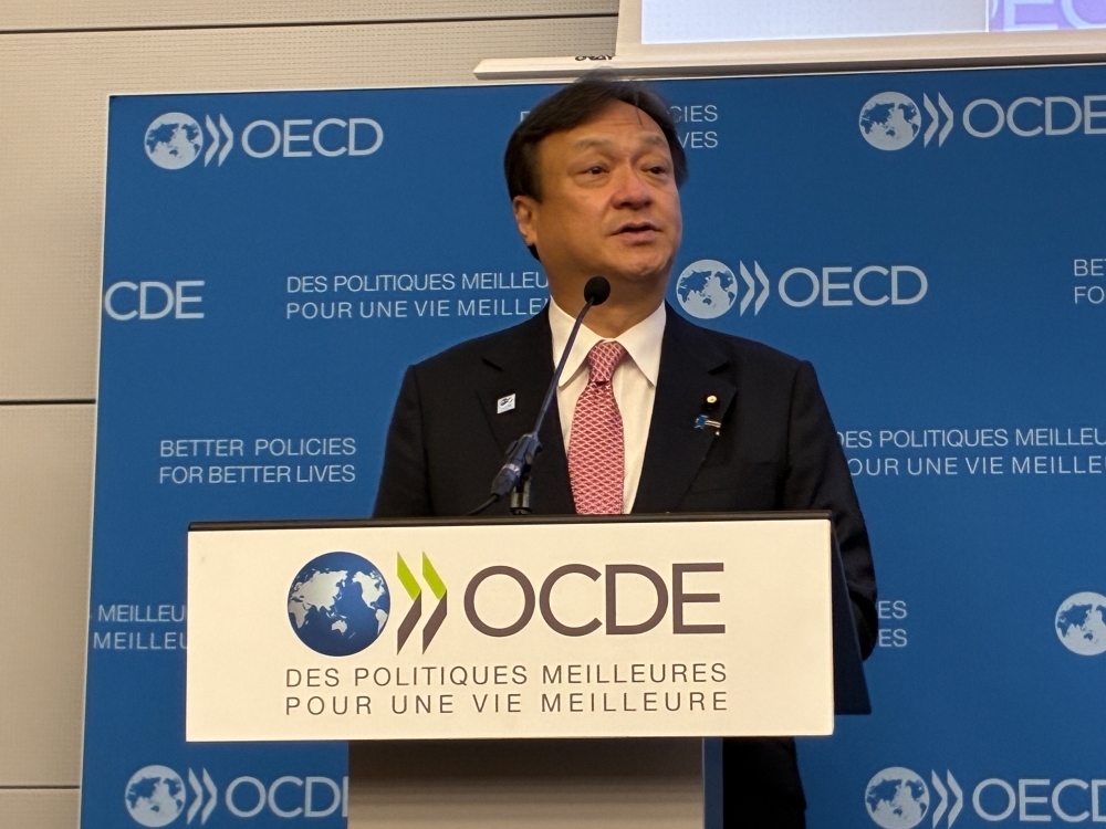 State Minister HORII delivering opening remarks at a side event