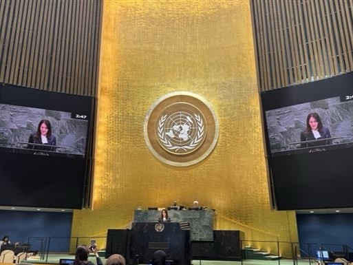 United Nations General Assembly Hall with Parliamentary Vice-Minister Eri on the screens