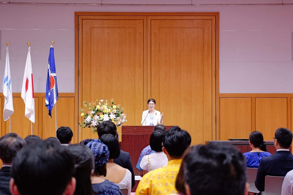 State Minister KUNIMITSU making her opening remarks