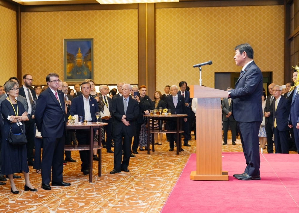 Foreign Minister MOTEGI delivering his remarks in front of the participants
