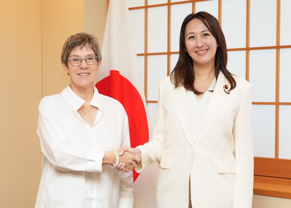 Parliamentary Vice-Minister ERI shaking hands with Ms. Annegret Kramp-Karrenbauer, Chairperson of the Konrad-Adenauer-Stiftung e.V.