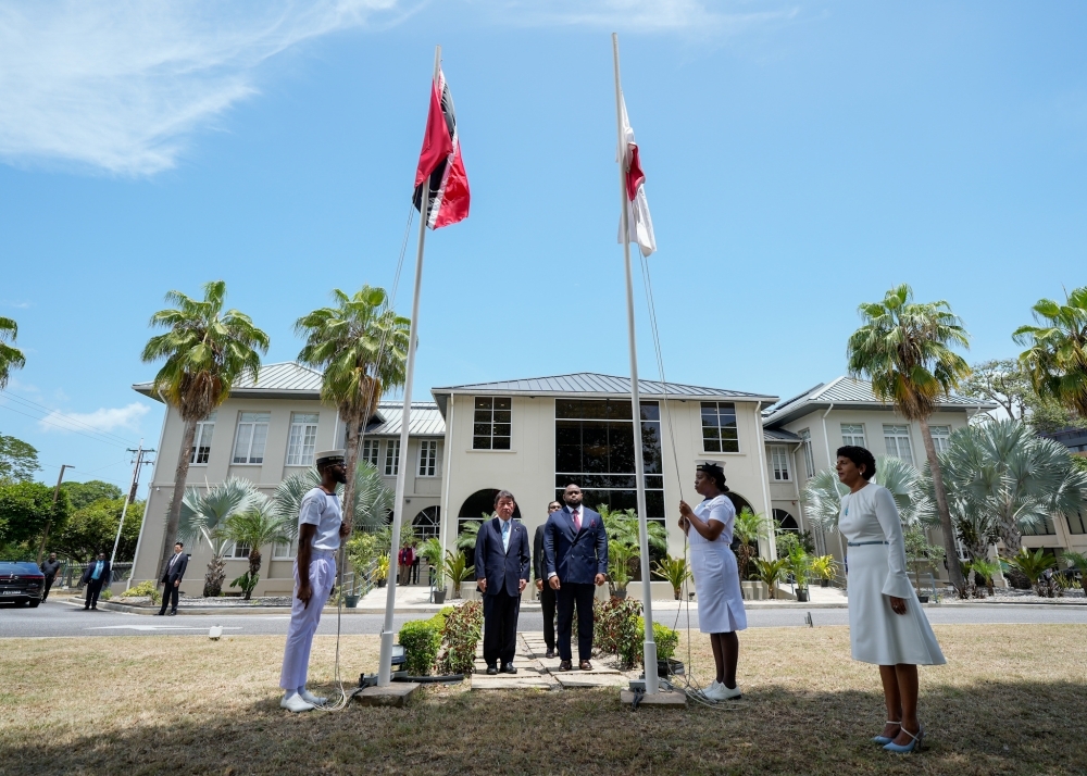 Minister MOTEGI and Minister Sobers standing at the welcoming ceremony