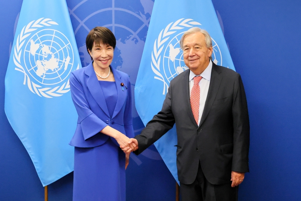 Prime Miniser TAKAICHI shaking hands wtih Mr. Guterres, Secretary-General of the United Nations