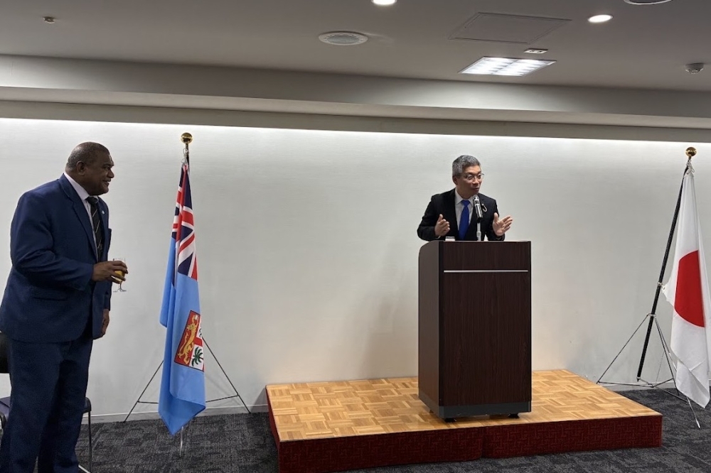 Parliamentary Vice Minister Fujii delivering his speech at the podium
