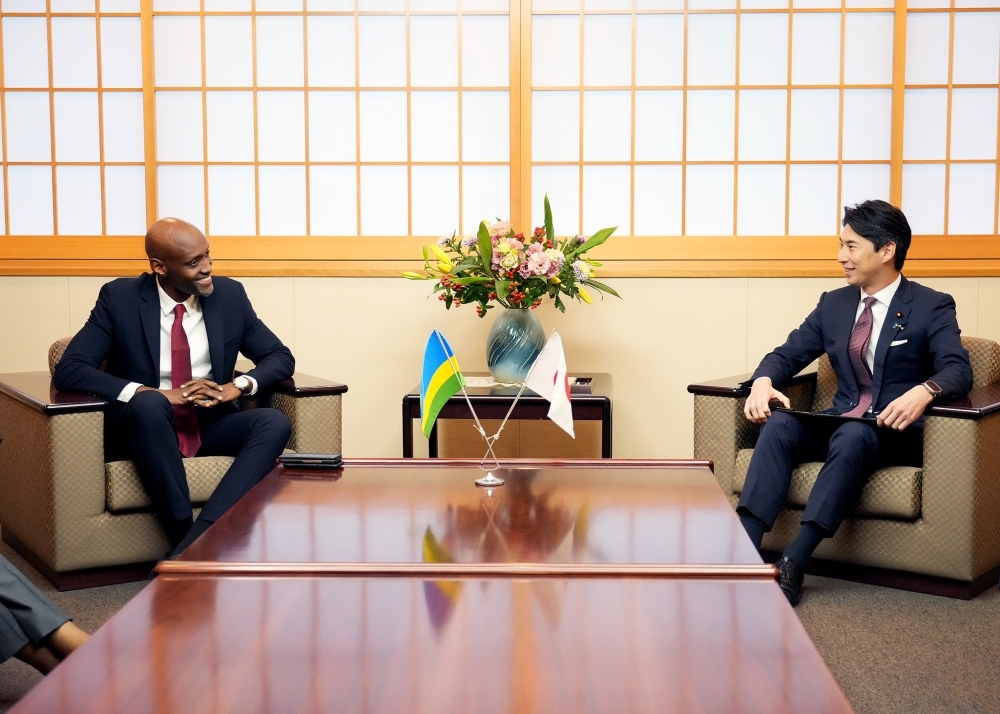 Meeting between State Minister NAKASONE shaking hands with Chief Executive Officer of Rwanda Development Board Jean-Guy AFRIKA