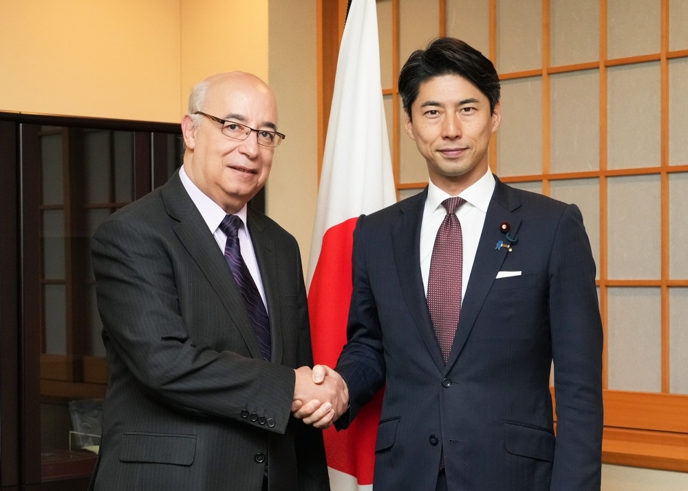 State Minister NAKASONE shaking hands with Mr. Toufik Milat, Ambassador of Algeria to Japan