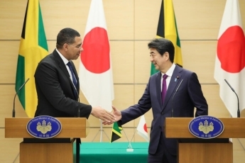 （写真11）共同記者発表（写真提供：内閣広報室）