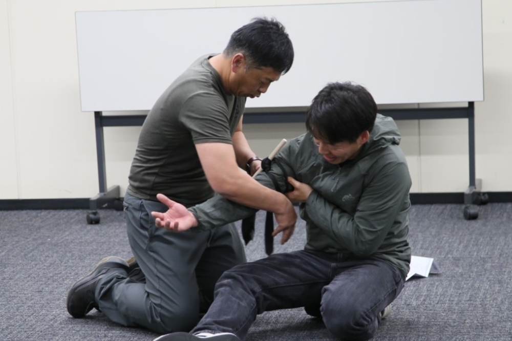 応急処置の実演の様子