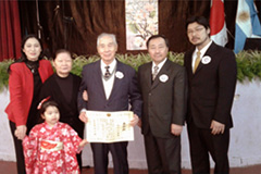 （写真4）細川正晴氏とそのご家族