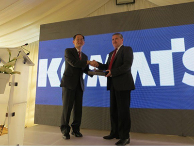A photo of delivery of key at equipment handover ceremony