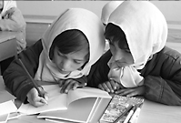 10.Girls learning at a primary school in Afghanistan (Photo: UNICEF/Shehzad Noorani/HQ03-0104)