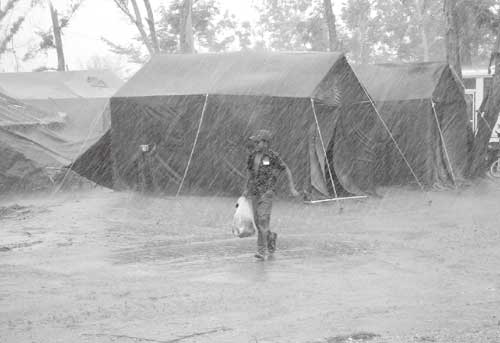 A camp for disaster affected people in torrential rain during the rainy season (Source: JICA)