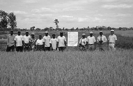 Mr. Tomitaka (far left) at a training farm.
