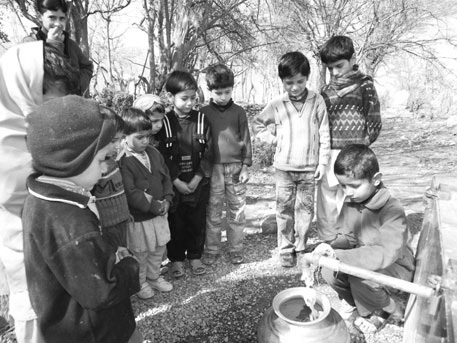 Boys at the water supply area (Photo: Mr. Kakehi)