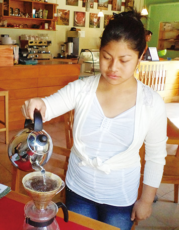 Angelica, who mastered the difficult hand drip coffee method and manages the café. (Photo: Yasumasa Ito)