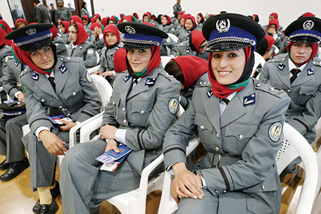 In November 2014, female Afghan police cadets traveled to Turkey to attend training that was provided through the support from Japan. At the International Airport in Kabul, the capital city of Afghanistan. (Photo: Kyodo News)