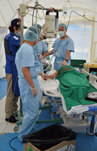 The J DR Medical Team performs surgery after the 2015 earthquake in Nepal. (Photo: JICA)