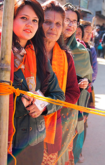 Women waiting to vote in a long line for the Constituent Assembly elections in Nepal in 2013 (Photo: Representative Shoko Noda)