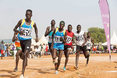 Mr. Akoon competing at the fourth sports event (Number 059, left front) (Photo: JICA)