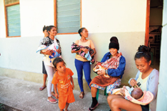 Transporting medicines and vaccines to coastal villages using the small boat provided by the project (Photo: SHARE)