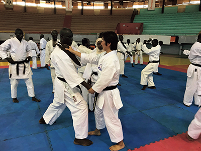 Participants learning karate from Japanese instructors (October, Senegal)