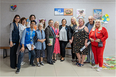 With the Ambassador of Japan to Moldova and the UNHCR Representative in the Republic of Moldova at a Refugee Accommodation Centre (the author is first from the left of the front row)