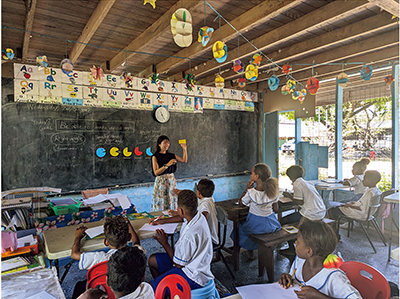 The author teaching mathematics to third graders