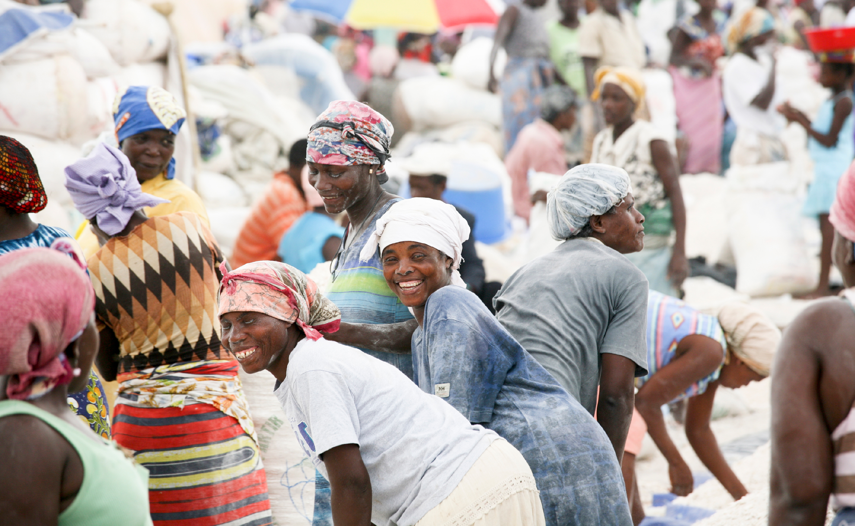 Women working with smiles on their faces