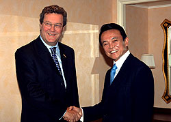Mr Alexander Downer and Mr Taro Aso